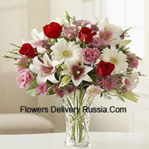 Schöne Nelken, Gerberas und Rosen in Vase